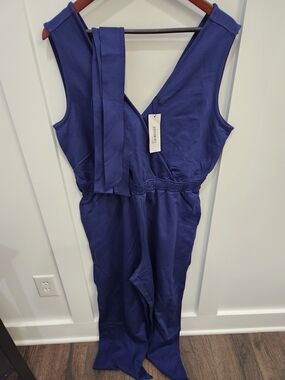 Sleeveless V-Neck Navy Jumpsuit with Waist Tie